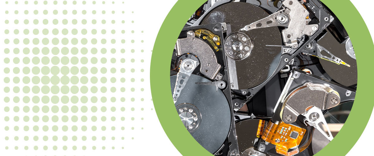 a graphic image of a collection of old hard drives, ready to be shredded